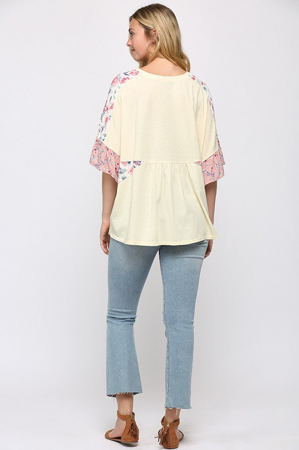 Solid and Floral Prints Mixed Half Peplum Top