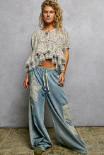 Load image into Gallery viewer, Ruffle Detail Neck Loop Floral Balloon Sleeve Woven Top