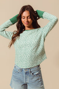 Textured Floral Knit Top With Contrast Cuffs